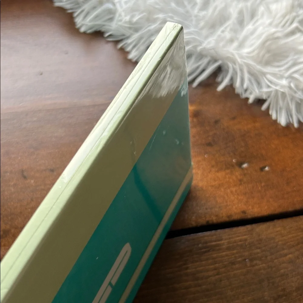 Clinique Teal & Mint Elastic-Band Notebook